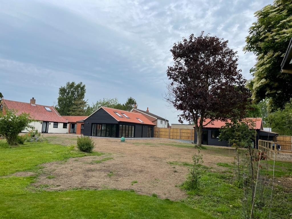 Cottage extension — glazed doors and patio