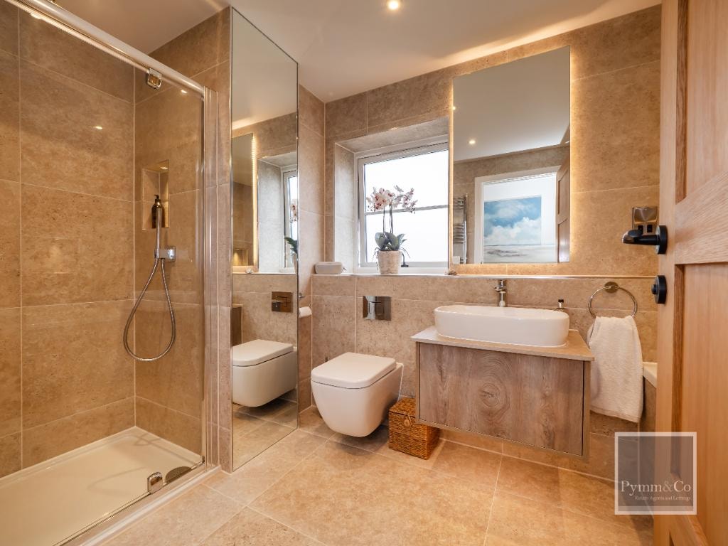 Malthouse refurbishment — contemporary bathroom with walk-in shower and vanity